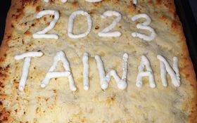 Blechkuchen mit der Aufschrift WGT 2023 Taiwan